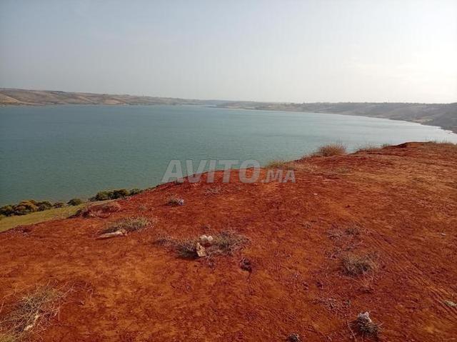 Terrain en face du lac