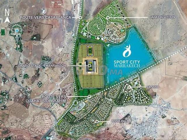 Terrain r+2 avec cave à sport city marrakech