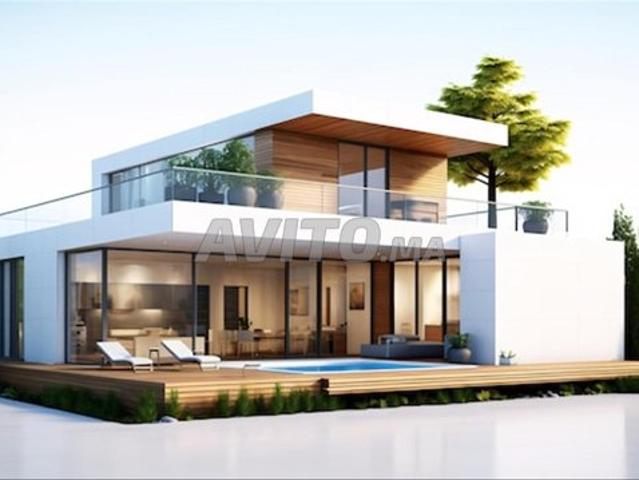Terrain zone villa avec 2 faces à Hay Mohammadi