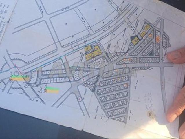 Terrain 100 mètre garage 4 étages lotissement