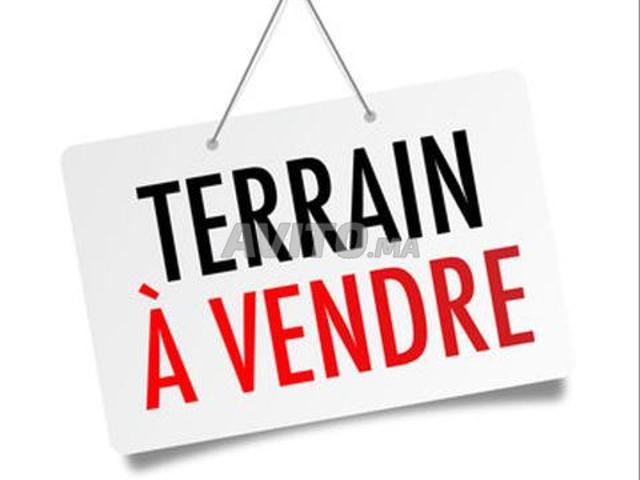 Terrain 100m deux façade