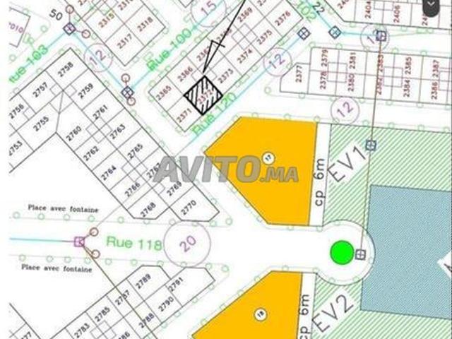Terrain 139 m² R 4 avec cave et garage commercial