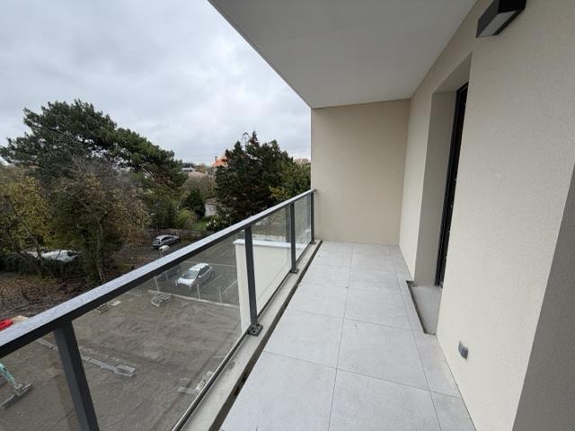 Terrasses Parking au pied des commerces