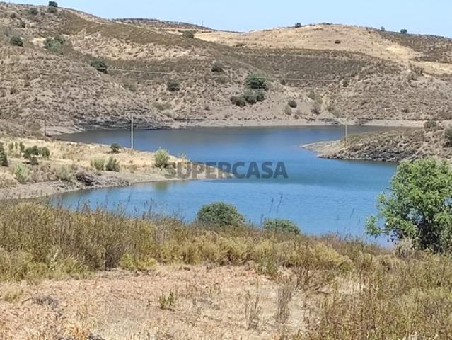 TERRENO COM 100.060 M2 POSSIBILIDADE DE CONSTRUÇÃO HABITAÇÃO E/OU TURISMO JUNTO A BARRAGEM DA CAROUCHA BOTELHAS CASTRO MARIM ALGARVE