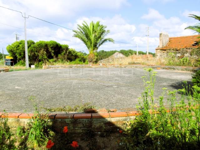 Terreno com casa
