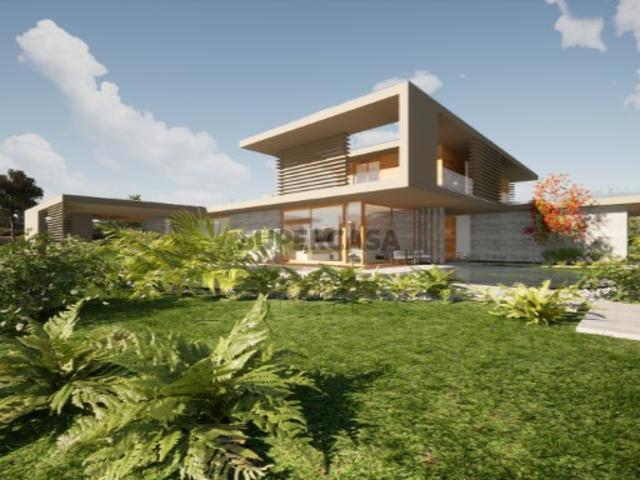 Terreno com projeto aprovado para construção de uma Moradia