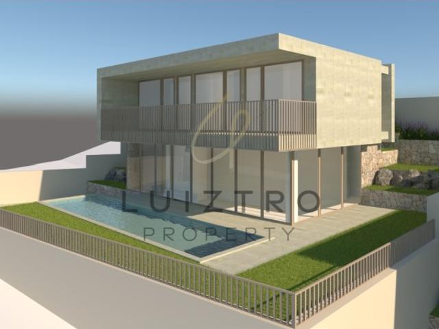 Terreno com projeto de moradia contemporânea e vista mar Ponta do Pargo