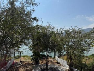 TERRENO CON TERRAZA CUEXCOMATITLAN