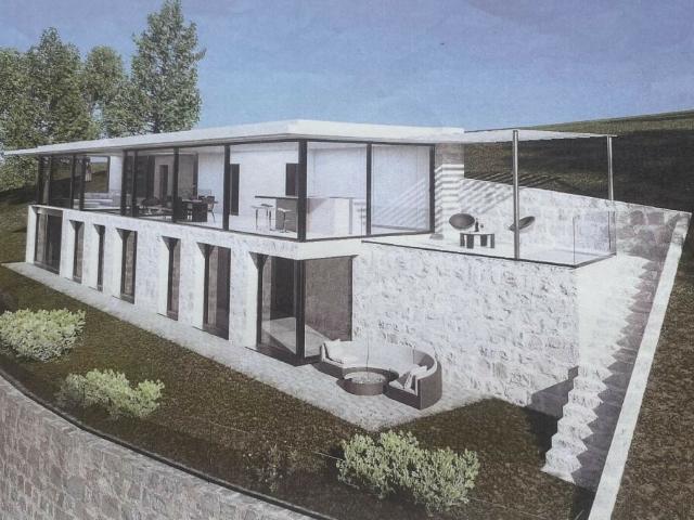 TERRENO CON VISTA LAGO E PROGETTO PER UNA VILLA A NEGGIO