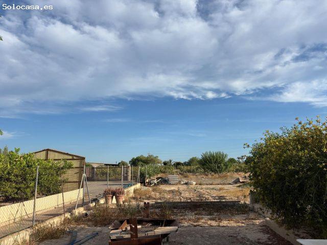 Terreno con almacén y barbacoa