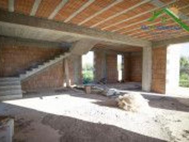 Terreno con casa