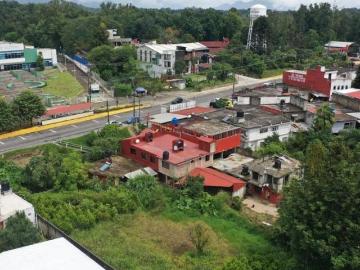 TERRENO CON CONSTRUCCION