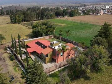 TERRENO CON QUINTA EN VENTA QUIROGA