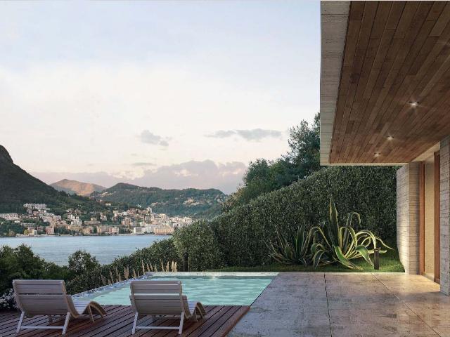 Terreno edificabile con vista mozzafiato sul Lago di Lugano Montagnola e Progetto Approvato Villa 10 locali