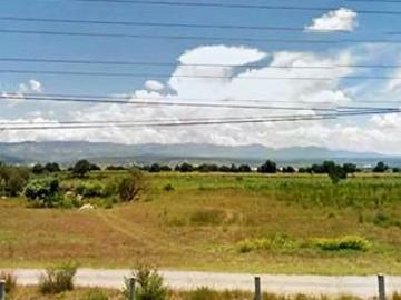 TERRENO GRANDE DE 14,240m2 SOBRE CARRETERA HACIA LA ENTRADA DE HUAMANTLA