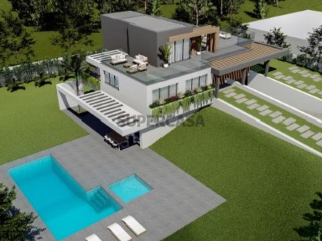 Terreno para construção de moradia unifamiliar com piscina