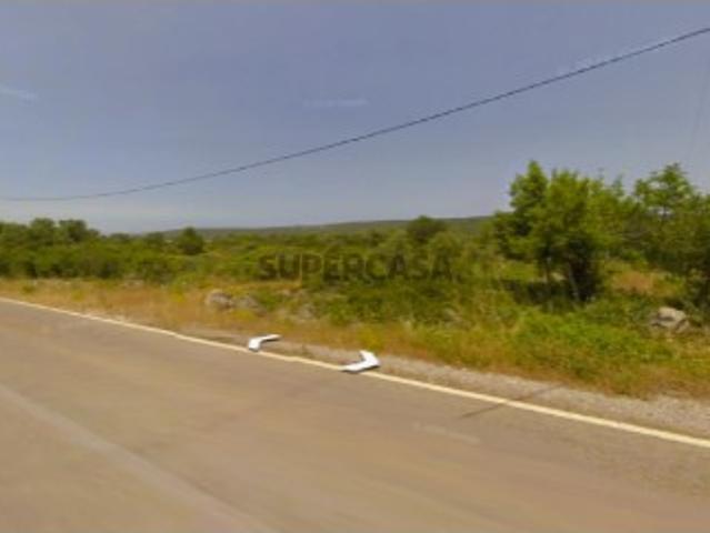 Terreno rustico em Zimbral Benafim com acesso estrada nacional