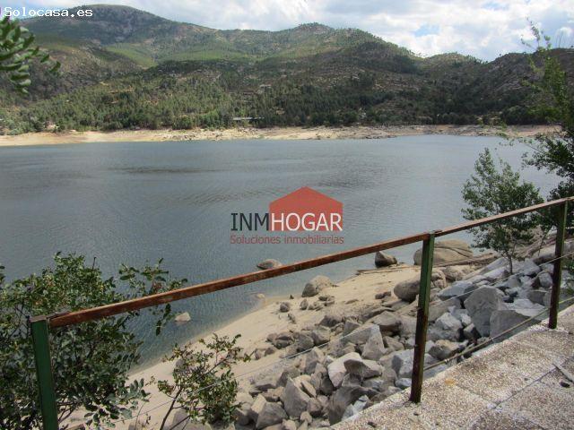 Terreno rústico en primera línea de pantano – 2.000 m2 de parcela