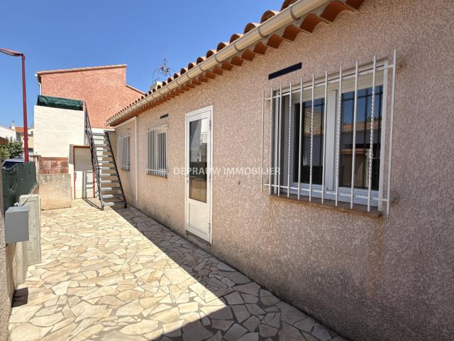 THÉZA Maison T3 de plain pied avec grand garage et terrasse