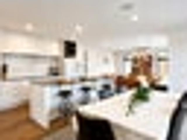 The 3 car garaging totally completes this home