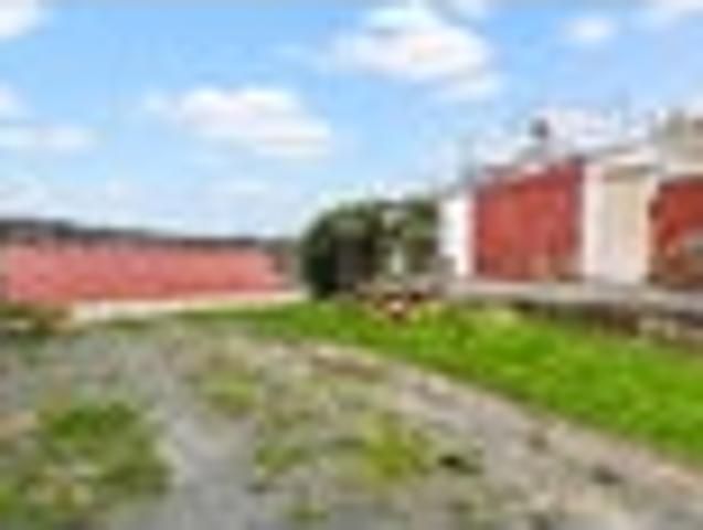 LAND SALE WITH EXISTING NON COMPLIANT HOME!