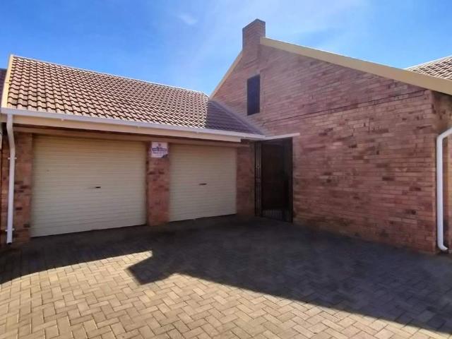 This beautiful corner unit with a double garage private garden situated In Langenhoven park is a mus