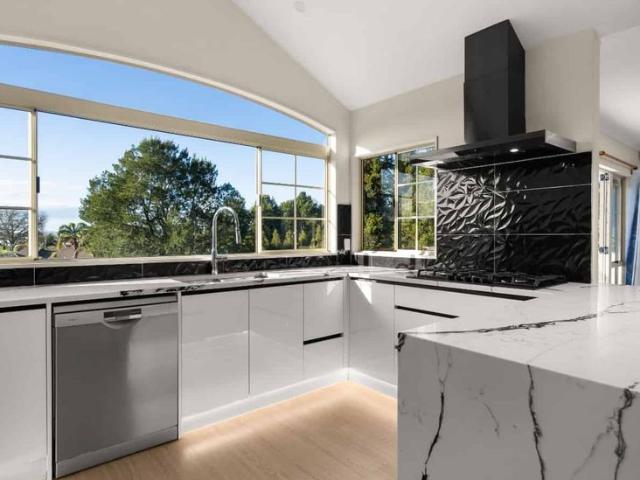 Three Car Garage, Grand Views and in Zone