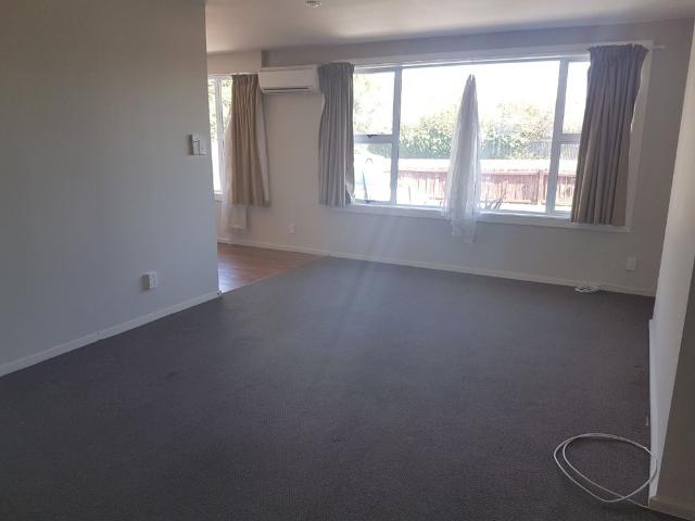 Three Double Bedrooms And Garaging In Great Location