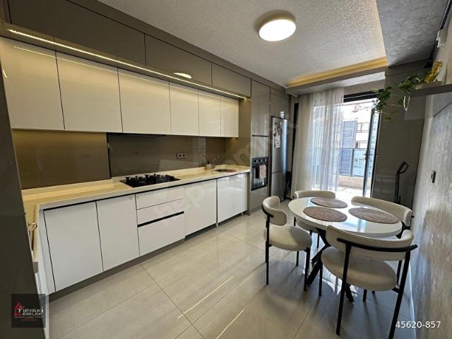TİRYAKİ'den_DUTLUK METROSU YANI_ORTA KAT_YENİ BİNA_TERAS BALKON