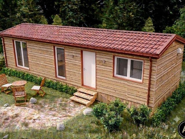 Tiny House ohne Grundstück Neuwertiger Bungalow im Blockhausstil