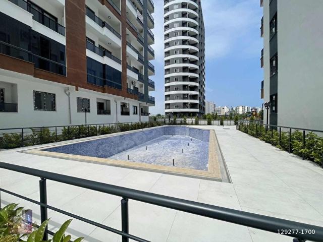 TÖMÜK TERRACE PARK 2'DE GENİŞ OTURUMLU SATILIK 1+1 YAZLIK