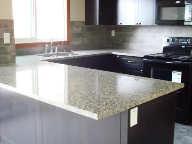 TOP FLOOR CORNER UNIT! Stylish 2 Bedroom Condo