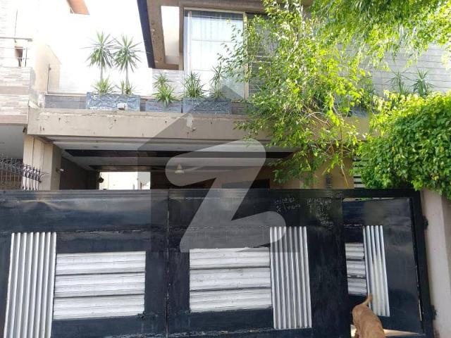 Top Location On 70 Feet Road Lightly Used 10 Marla Bungalow With Full Basement Facing 2 Kanal Very Close To Wateen Chowk