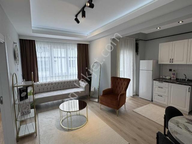 Toplu Konut Bulvarı Bir Alt Sokağı Kiralık Sıfır Eşyalı 1+1