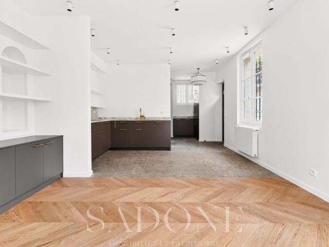 Tout savoir sur cette maison dans le quartier Ile de la Jatte Parc d'Orléans, à Neuilly sur Seine