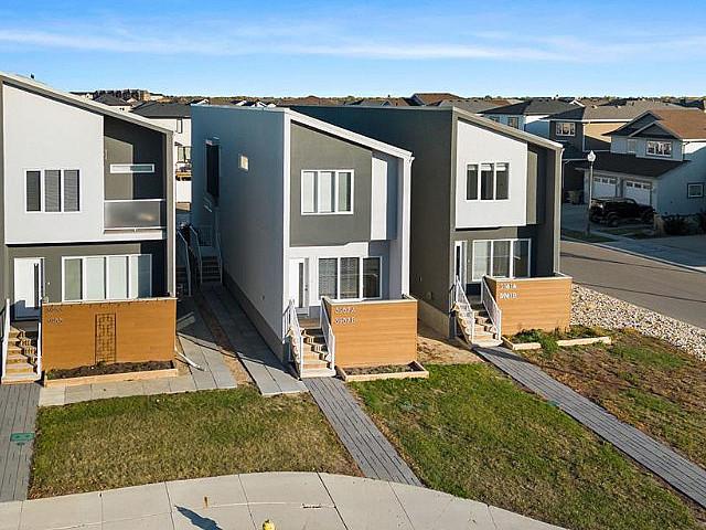 Townhouse Duplex With 2 Regulation Suites In Harbour Landing!