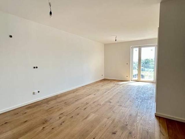 Traumhafte Erstbezug Wohnung mit Balkon in Mannswörth
