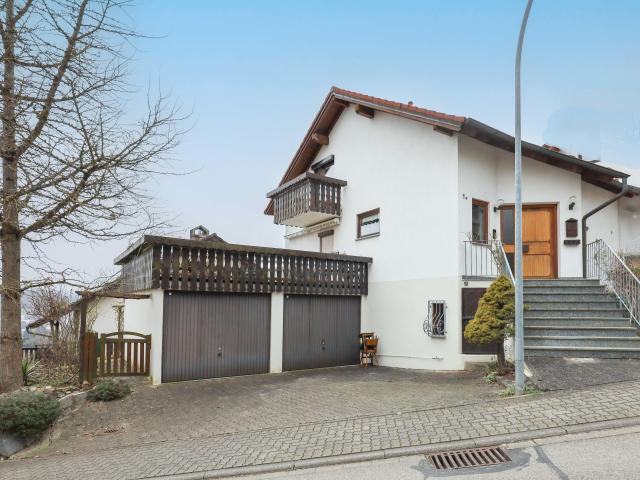 Traumhafte Lage Einfamilienhaus mit Doppelgarage und schönem Weitblick