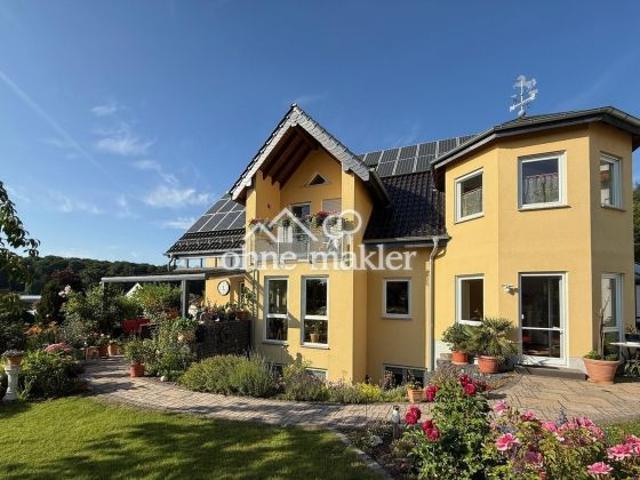 Traumhaftes Effizienz Einfamilienhaus mit ELW/Praxis/Büro in bester Wohnlage!