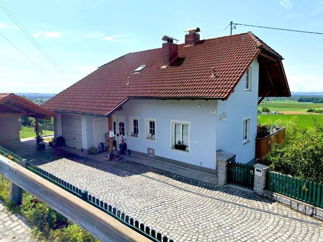 Gepflegtes Einfamilienhaus mit Aussicht in Hanglage – Zwei Wohneinheiten mit viel Potenzial