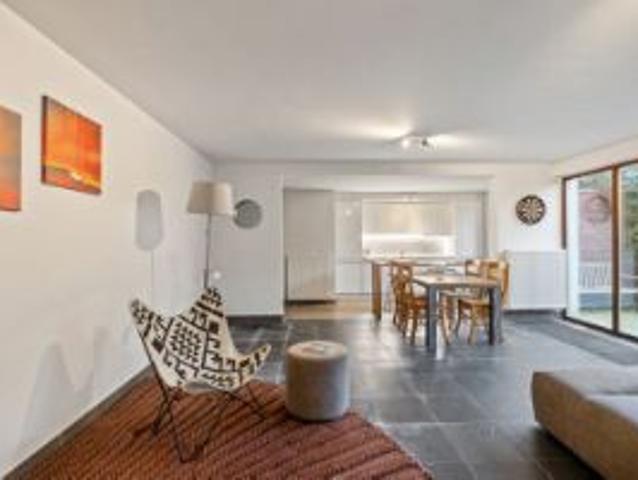 Trendy gelijkvloers appartement met tuin