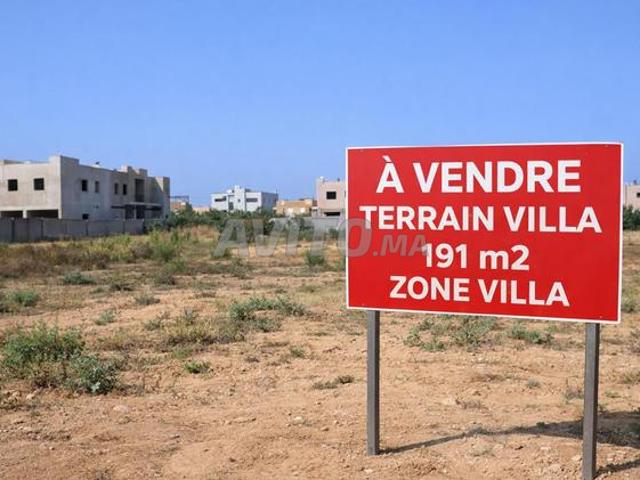 Très bon terrain zone villa titre