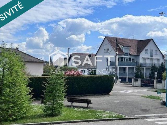 Très jolie appartement 2 pièces d'une superficie de 53m² avec garage et belle terrasse de 18m² situé à village neuf