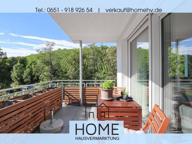 Trier Olewig: TOP moderne 3 ZKB Wohnung mit Balkon, Einbauküche und zwei Stellplätzen