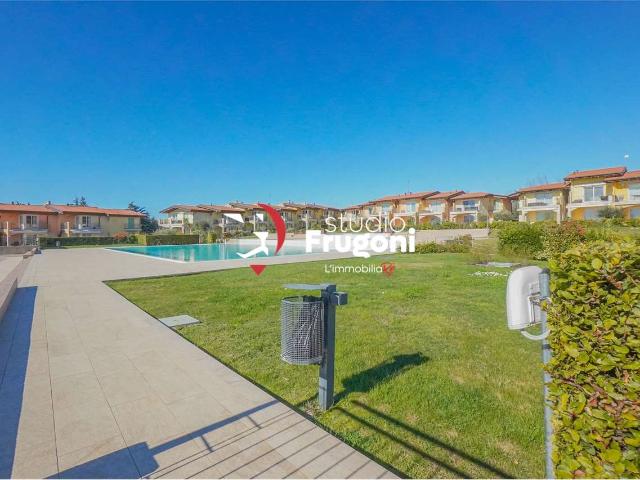 TRILOCALE CON TERRAZZO E AUTORIMESSA IN RESIDENCE CON PISCINA