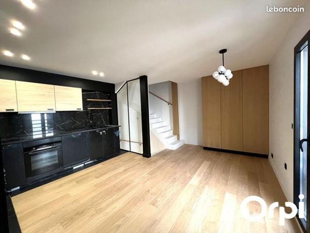 Triplex 4 pièces 99 m²