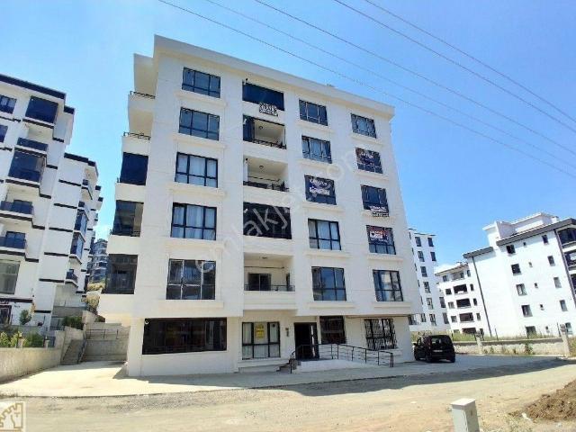 Truvadan Körfezde Geniş Hollü Deniz Manzaralı Satılık 1+1 Daire