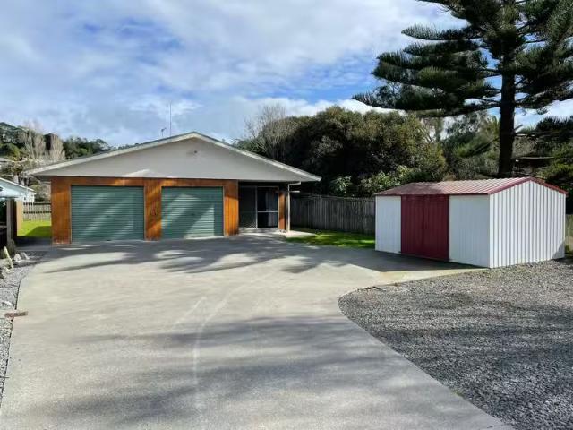 Two bedroom plus Sunroom on River Road. First National Real.