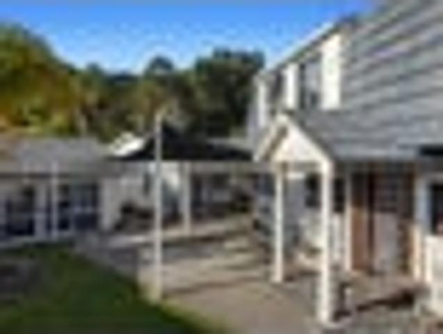 Two Homes Adjoined On One Title!