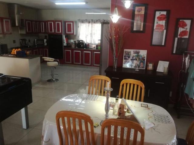 Two in one properties, four bedroom house with a vacant land for sale in safari gardens